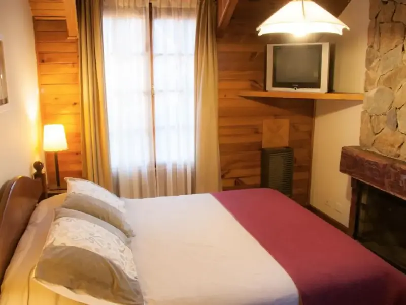 Cabañas Woodland dormitorio cama doble