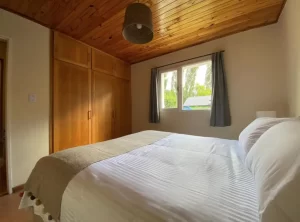 Casa Kumey dormitorio cama doble