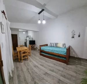 Departamentos El Sendero sala de estar con sofa cama