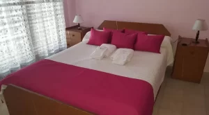 Aparthotel Santa Lucia cama doble en habitación