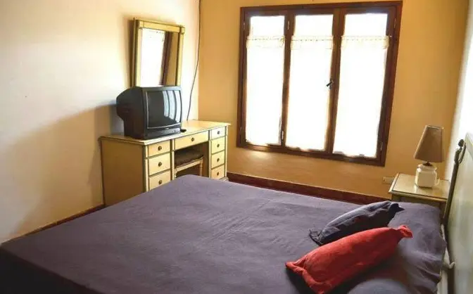 Cabañas Alfa Sol y Mar habitación con televisor