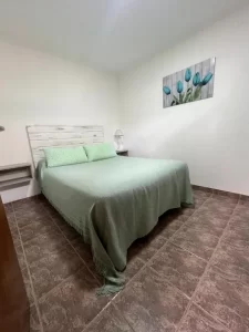 Cabañas Mechi cama doble verde