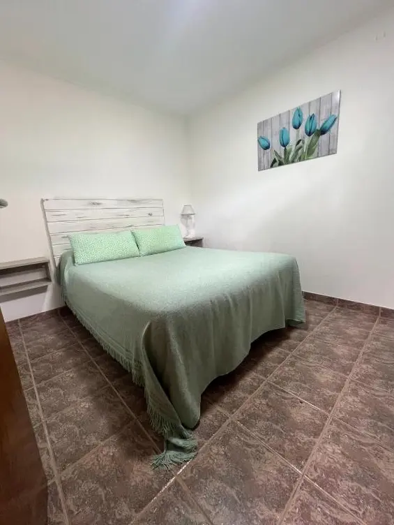 Cabañas Mechi cama doble verde