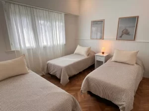 Casa Quiet House habitación con tres camas individuales