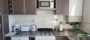 Departamento La Perla I cocina completa