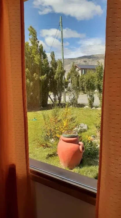 Cabaña Meely jardín desde la ventana