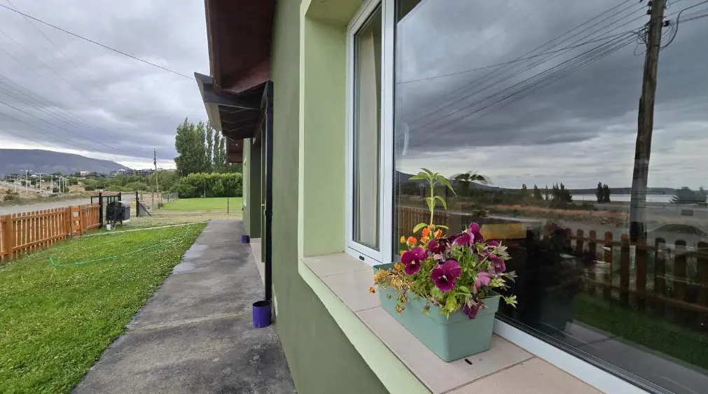 Cabañas El Amanecer ventana desde afuera