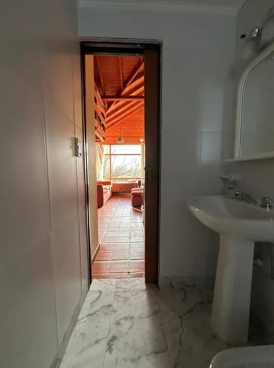 Cabañas Nevis puerta del baño