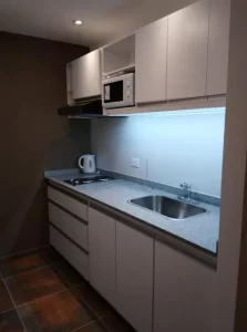 Departamentos Del Cerro cocina completa