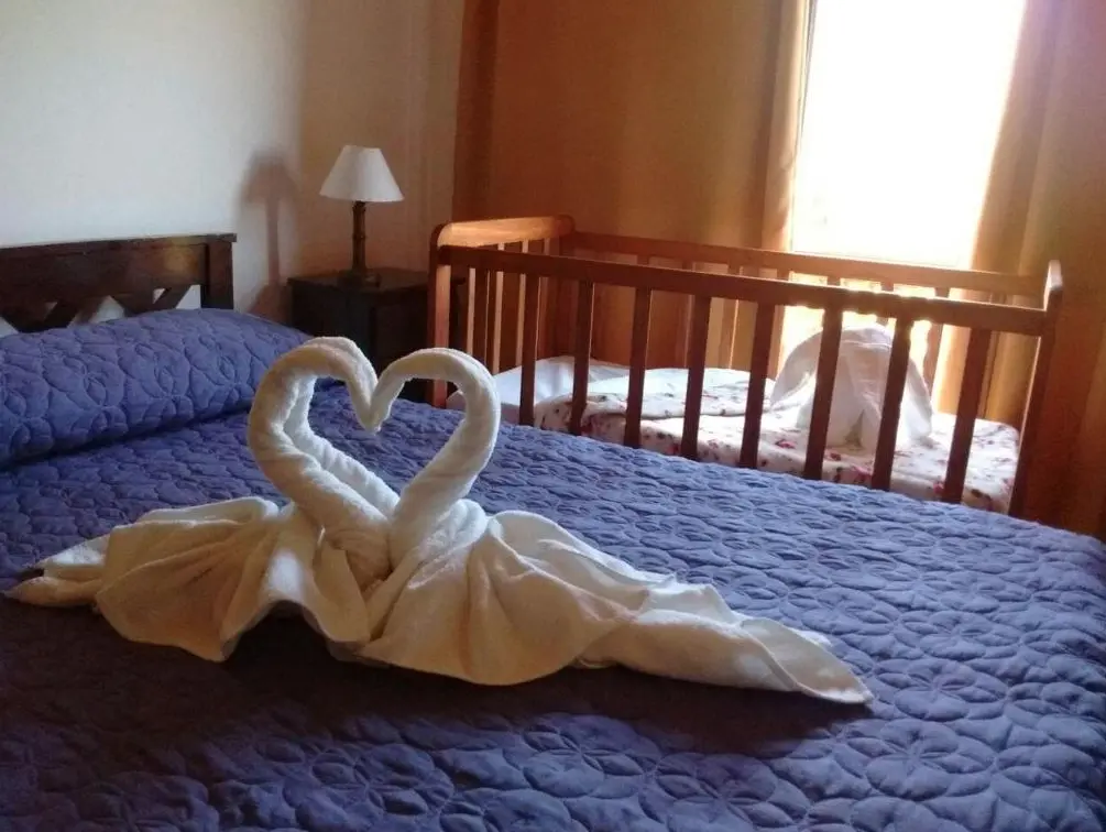 Cabañas Los Espinillos cama doble con toallas