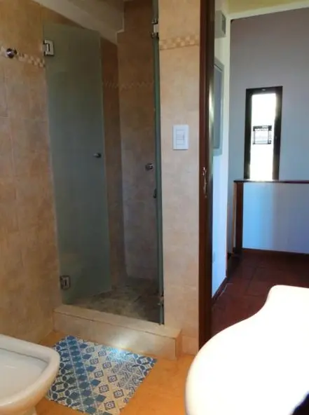 Cabañas Los Espinillos ducha del baño