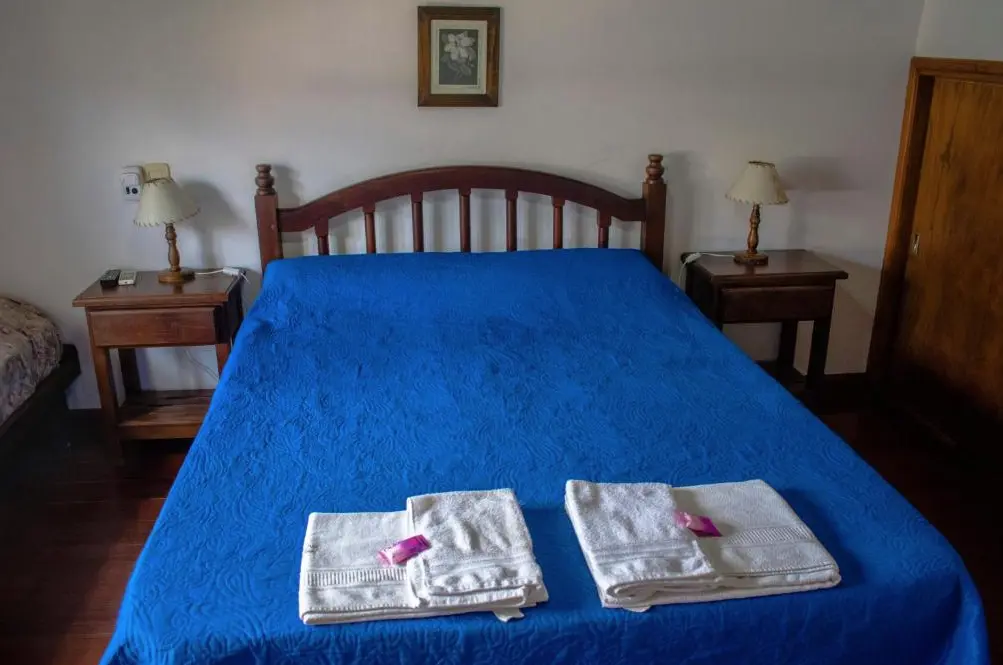 Cabañas Monteolivos cama doble con toallas