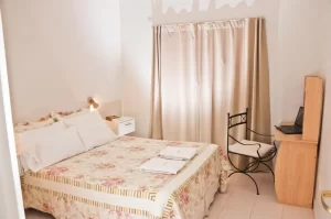 Departamentos La Lucila cama doble con toallas