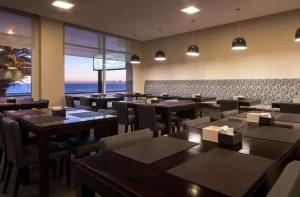 Hotel Dazzler by Wyndham Puerto Madryn mesas para comer