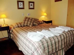 Hotel El Hornero Spa cama doble con toallas