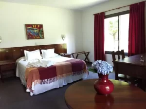 Hotel Spa Villa Merlo cama doble con toallas