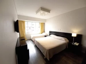 Hotel Versailles cama doble y cama individual