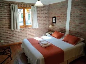 Aparthotel Peumayén cama doble con toallas