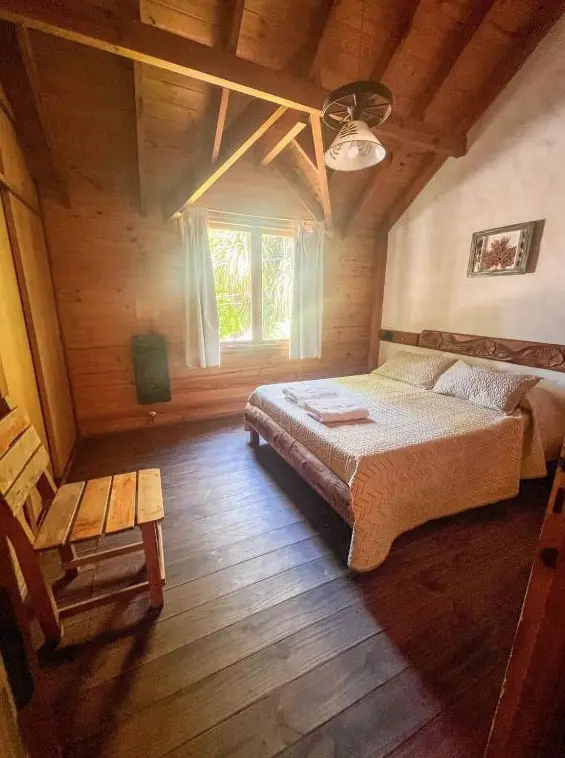 Cabañas Arique cama doble con toallas