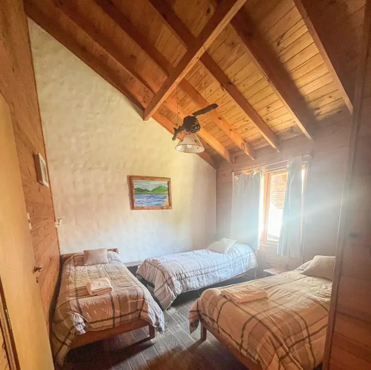 Cabañas Arique camas individuales con toallas