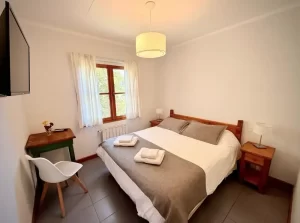 Hostería Bärenhaus cama doble con toallas