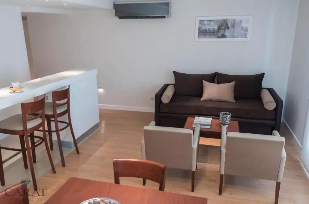 Aparthotel Carat sala de estar