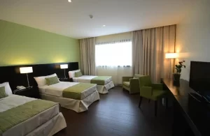 Hotel Grand Crucero habitación triple