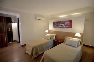 Hotel Guaminí Misión camas individuales