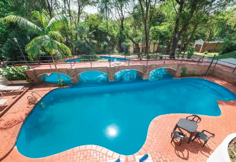 Cabañas El Leñador puente de la pileta