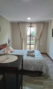 Departamentos Michel Iguazú cama doble con toallas