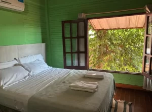 Departamentos Ogaguazu cama doble junto a la ventana
