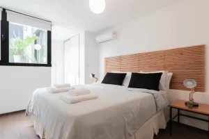 Casa Fliphaus Santa Fe cama doble con toallas