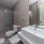 Departamentos Casa Piamonte espejo del baño