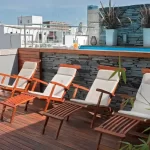 Departamentos Rosedal Suite sillones de la pileta