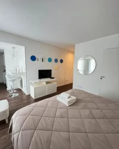 Departamentos Syrah Studios cama doble con toallas