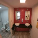 Hostel Malevo Muraña antebaño