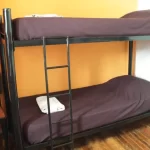 Hostel Play Soho cucheta con toallas