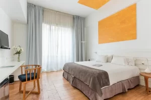 Hotel BA Jardines Palermo cama doble junto a la ventana