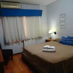 Aparthotel San Lorenzo cama doble con toallas