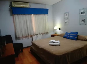 Aparthotel San Lorenzo cama doble con toallas