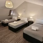 Aparthotel Soltigua camas individuales con toallas