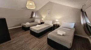 Aparthotel Soltigua camas individuales con toallas