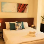 Aparthotel Uvas cama doble con toallas