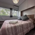 Departamento 9 de Julio 1357 cama doble con toallas