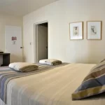 Hotel Abril cama doble con toallas
