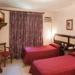 Hotel Carollo camas individuales 