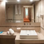 Hotel Carollo espejo del baño
