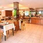 Hotel Carollo mesas para comer