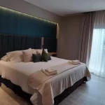Hotel Fuente Mayor cama doble con toallas