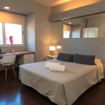Hotel Hathor cama doble con toallas
